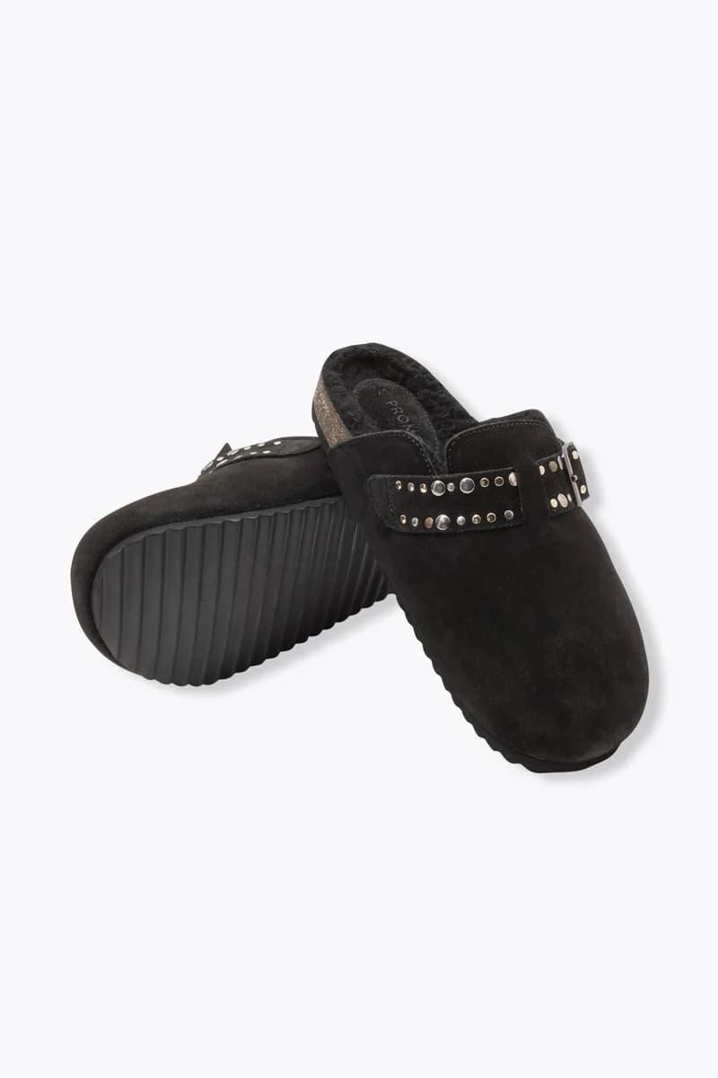Sabots en cuir fourrés Femme