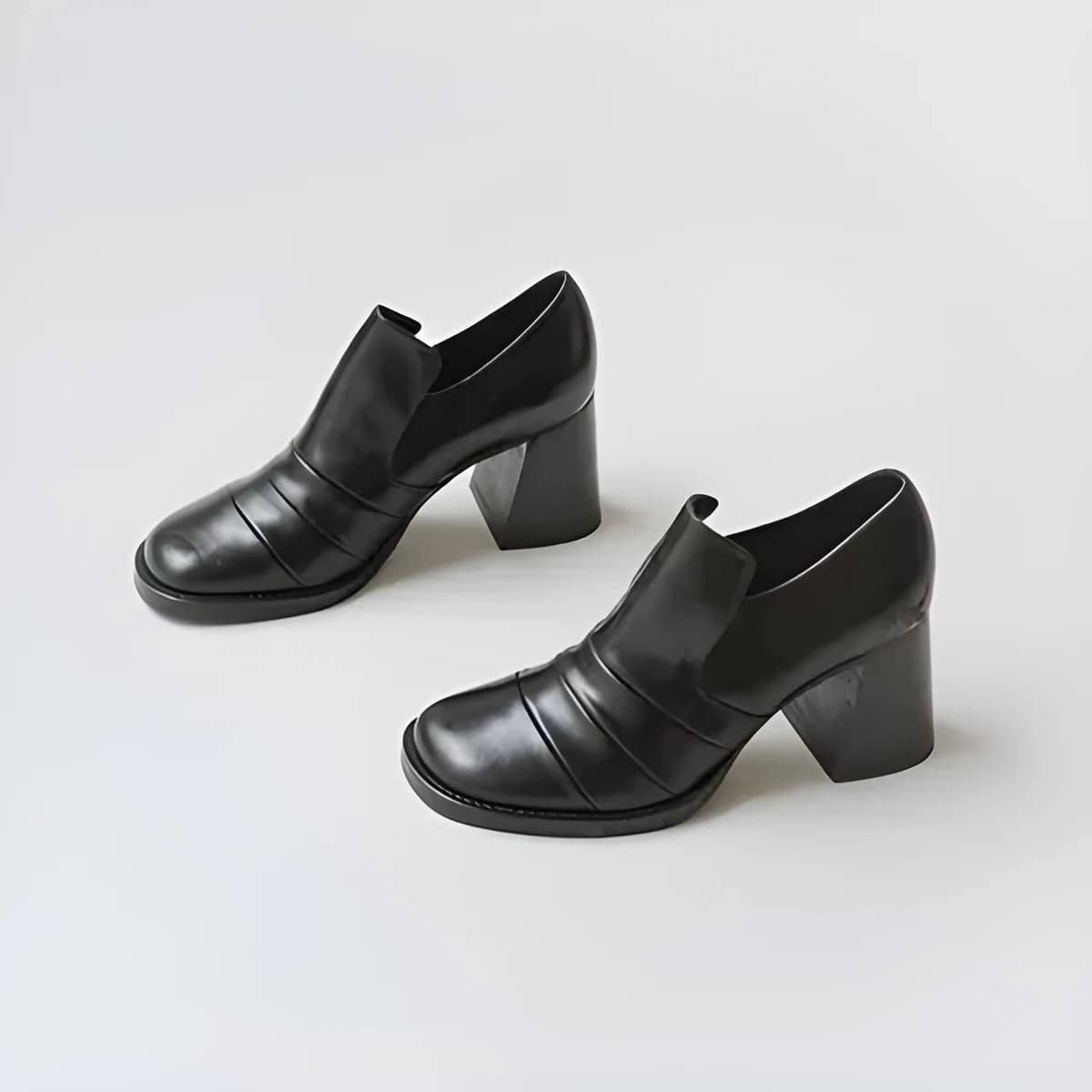 Mocassins à talons en cuir noir