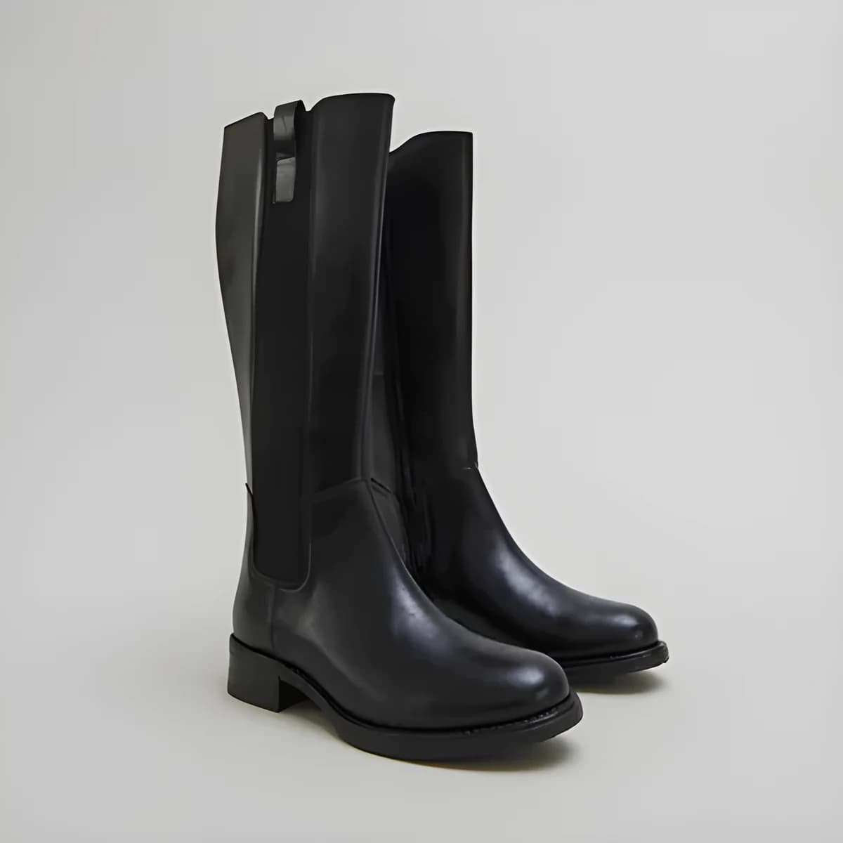 Bottes plates à bouts ronds en cuir noir