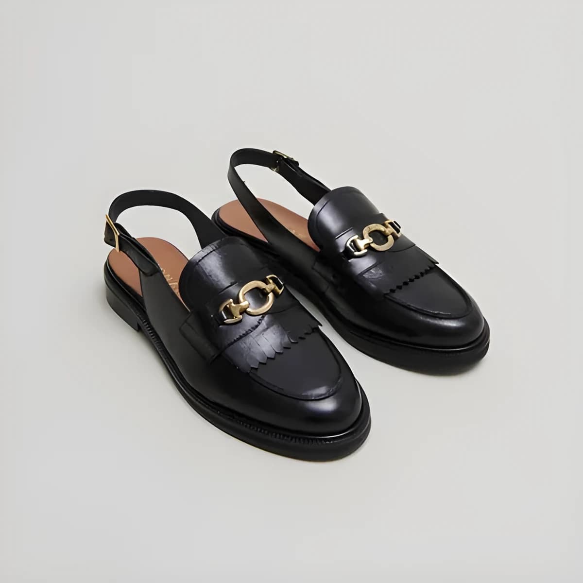 Mocassins à bouts arrières ouverts en cuir noir